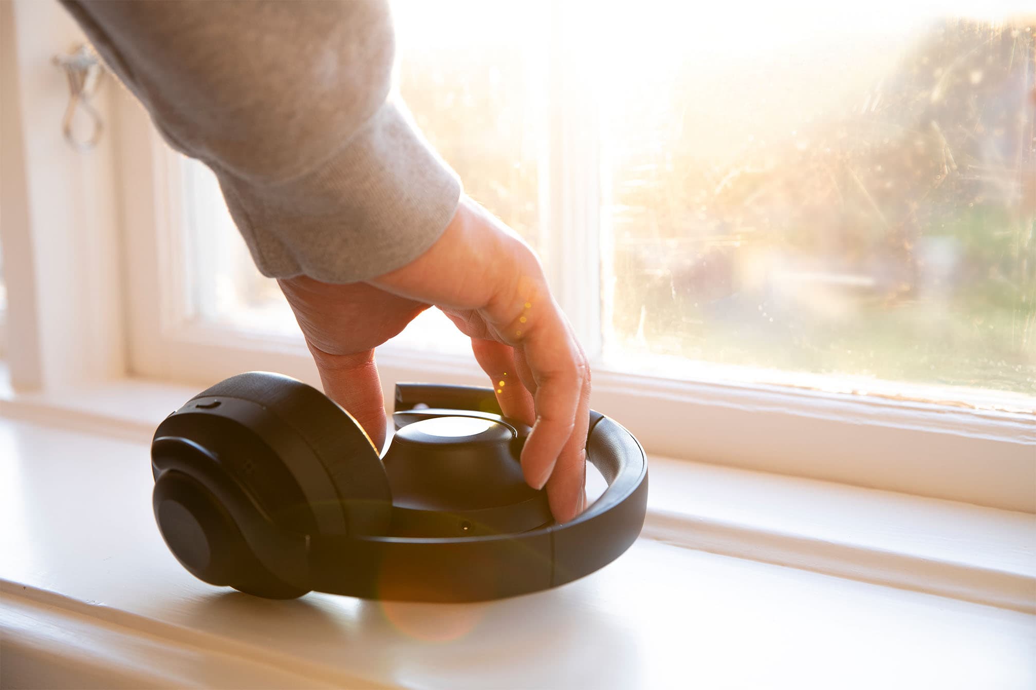 Headphones and window